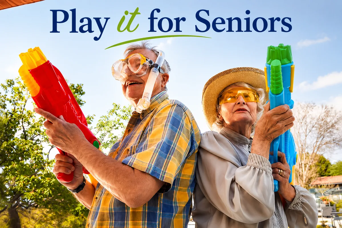 Smiling seniors with water guns enjoying playful activities outdoors